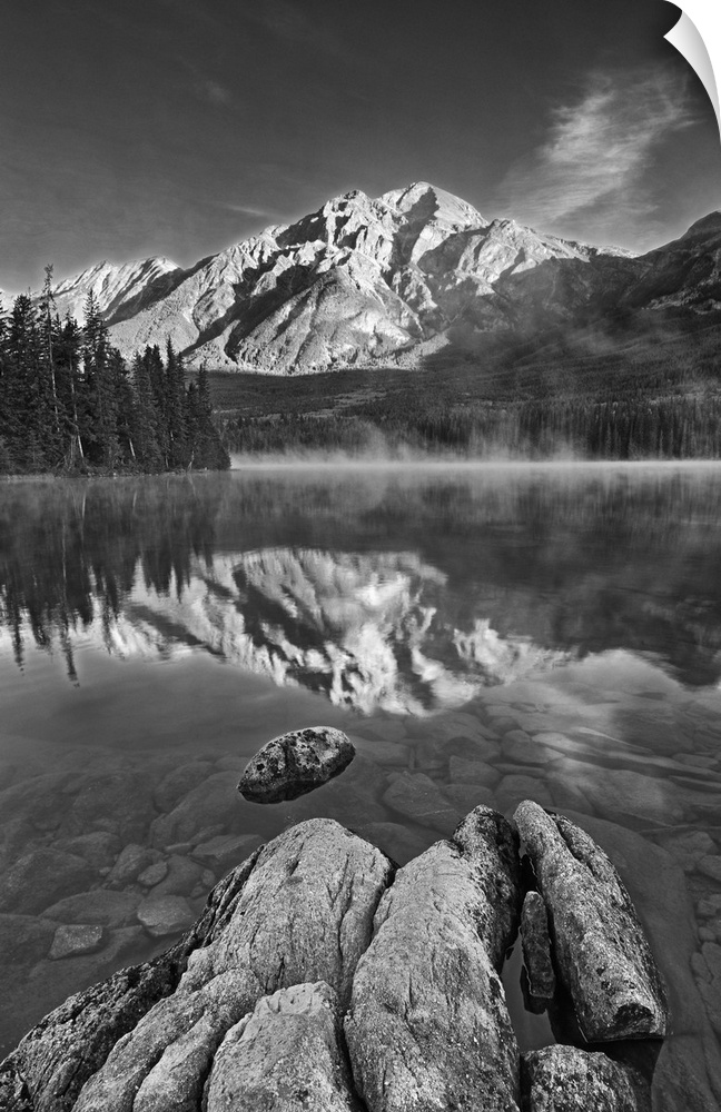 Canada, Alberta, Jasper national park. Pyramid mountain reflected in Pyramid lake at sunrise.