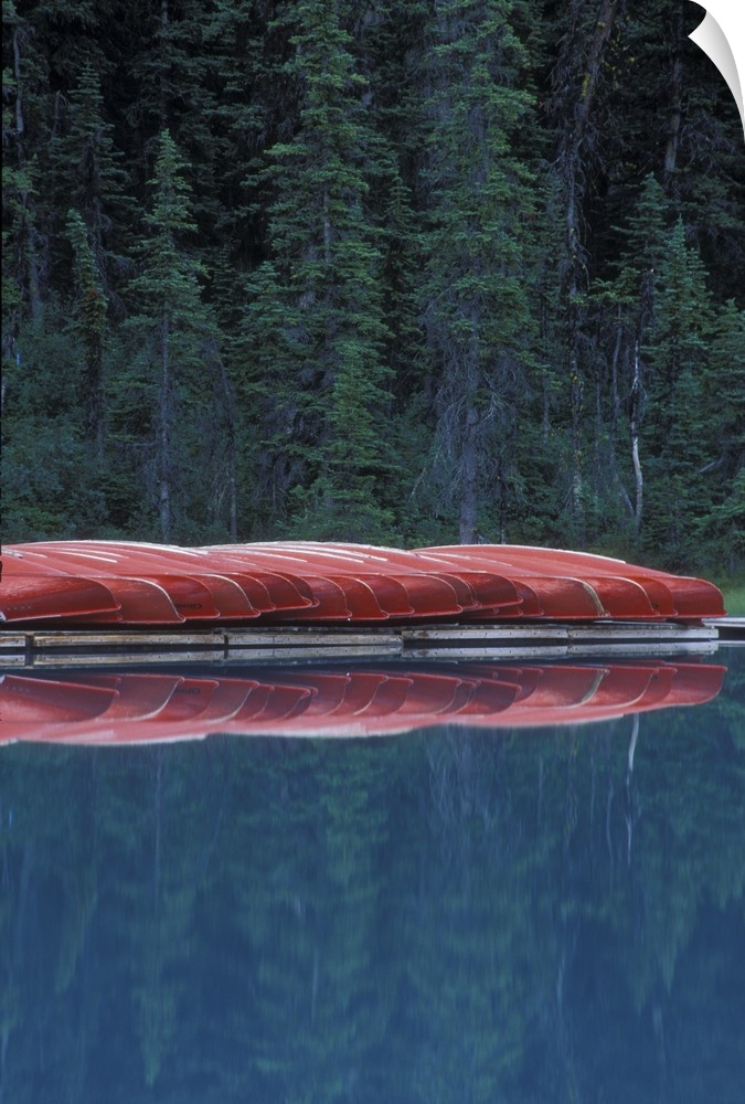 Canada, Banff, Alberta. Canoes line the shores of Lake Louise. Credit as: Josh Anon / Jaynes Gallery / DanitaDelimont.com