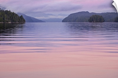 Canada, British Columbia, Calvert Island, Sunset reflections on water