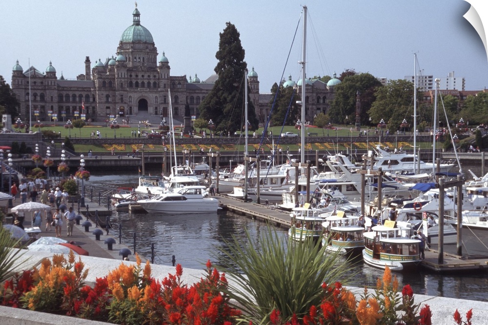 Canada, British Columbia, Victoria.Parliament Building, with ships and docks in foreground