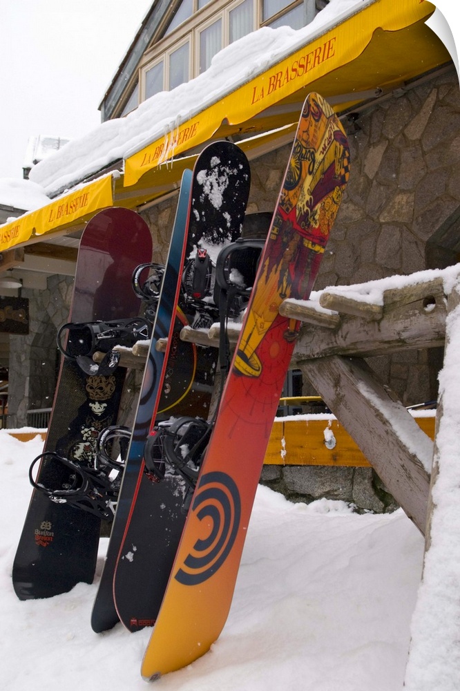 CA, BC, Whistler Village.  Snowboards outside cafe in fresh snow