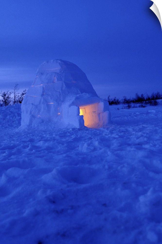 NA, Canada, Manitoba, Churchill.Arctic igloo with candle light inside