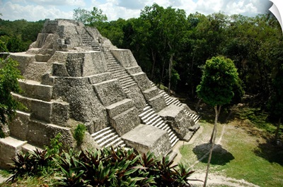 Central America, Guatemala, Yaxha, classic Mayan pyramid surrounded by jungle