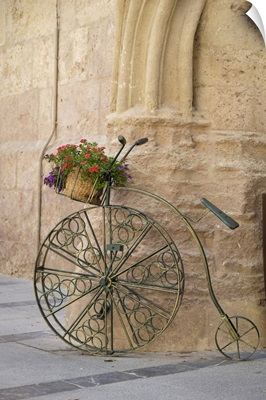 Cordoba, Spain, Bicycle Planter In Front Of Old Stone Building