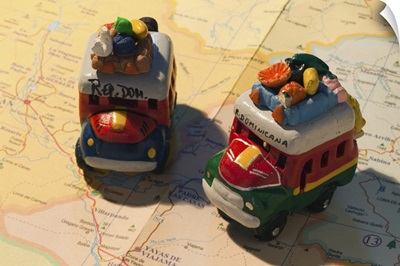 Dominican Republic, Punta Cana Region, Bavaro, toy busses on Dominican map