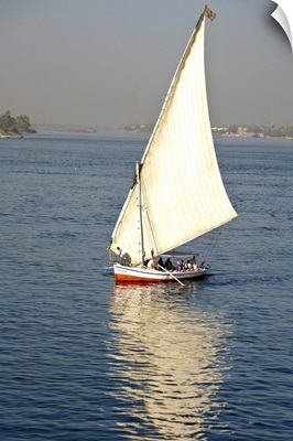 Egypt, Luxor. A felluca sailboat on the waters of the Nile