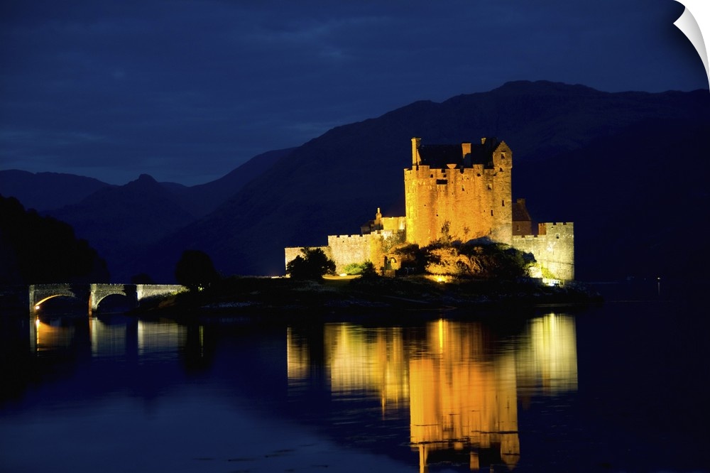 Beautiful Eileen Donan Castle in Western Dornie in Highlands os Scotland the most photographed castle in the world at nigh...