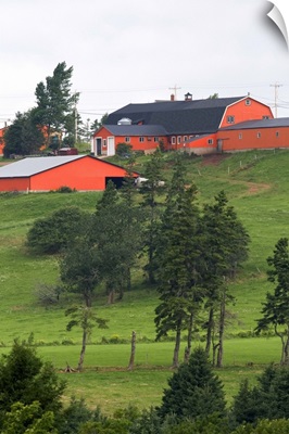 Farm and red barn on a hill at New Glasgow, Prince Edward Island, Canada