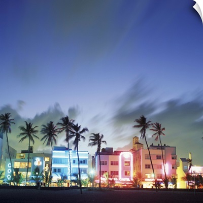 Florida, Miami, South Beach. Art Deco architecture and palm trees along the strip