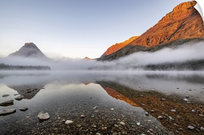 Foggy Sunrise Over Two Medicine Lake In Glacier National Park, Montana, USA