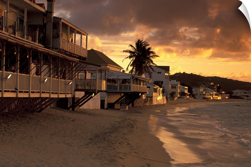 Caribbean, French West Indies, St. Martin.Grand Case; Il Nettuno and beach, sunset; St. Martin's dining capital.