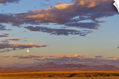 Full moon rises above the Highwood Mountains near Great Falls, Montana