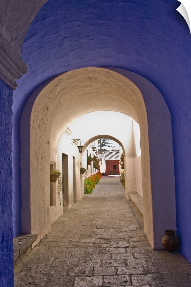 Graceful archways of Monasterio Santa Catalina in the "White City" of Arequipa, Peru.