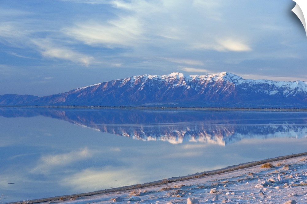View from Antelope Island Causeway at sunset of Great Salt Lake and Northern Wasatch Mountains including Willard Peak and ...