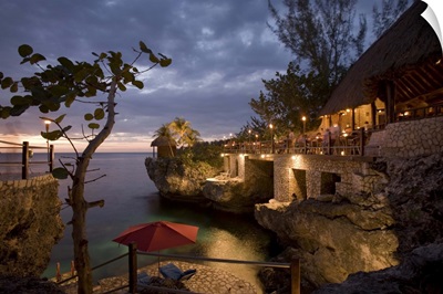 Jamaica, Negril, Rockhouse Hotel at dusk along Caribbean Sea