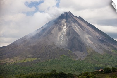 Lava rocks are thrown from the erupting Arenal volcano, Costa Rica