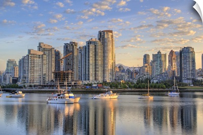 Looking across False Creek at the skyline of Vancouver, British Columbia at sunrise