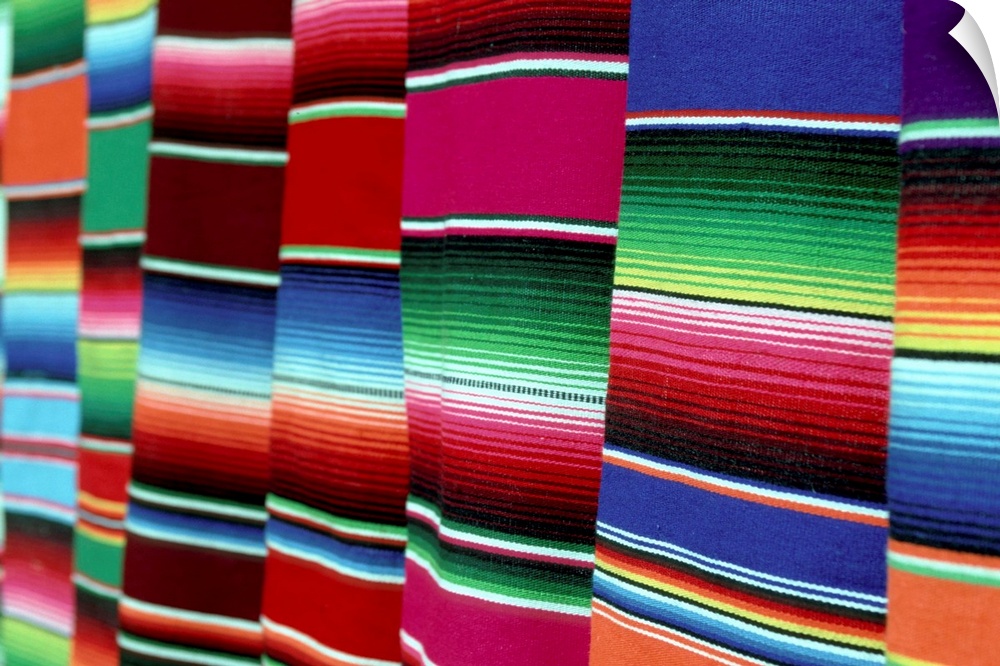 Mexico, Oaxaca. Colored blankets for sale.