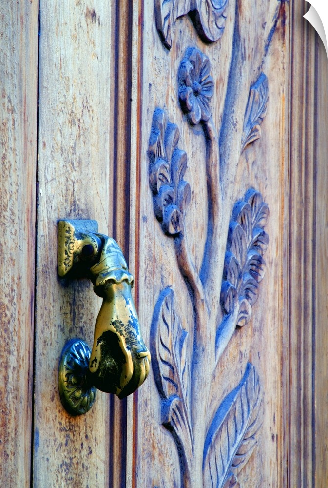 Mexico, San Miguel de Allende, hand-shaped wooden door knocker.