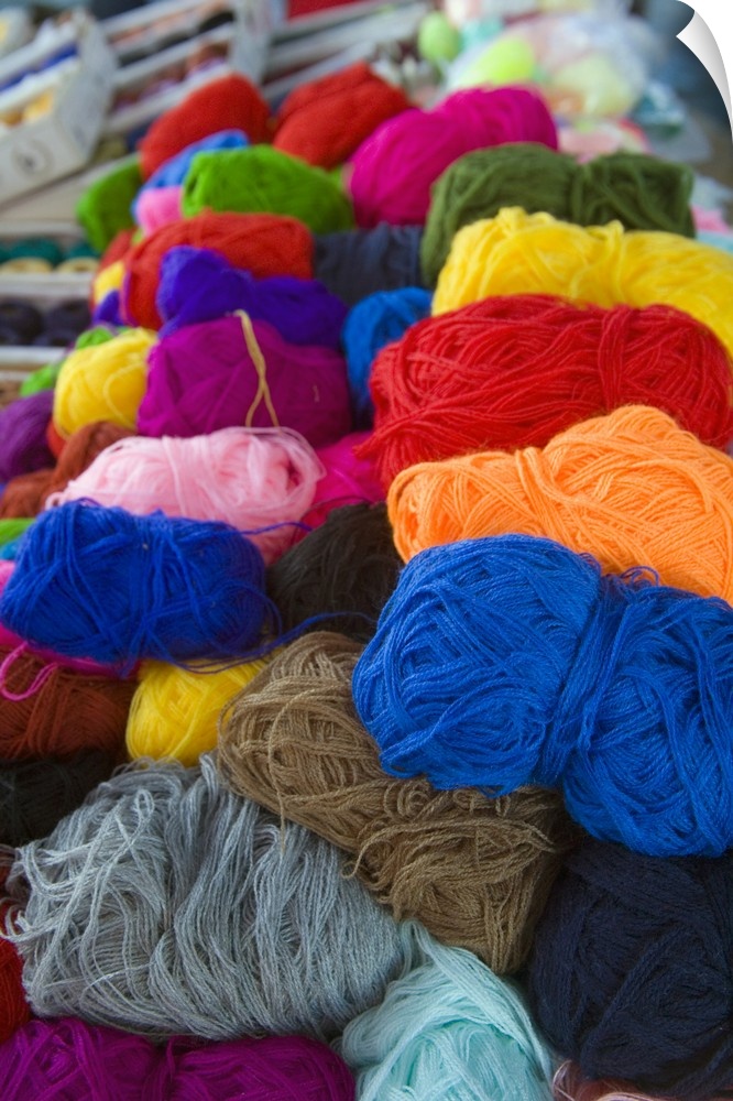 North America, Mexico, Guanajuato state, San Miguel de Allende. Yarn on display at the local Tuesday market.