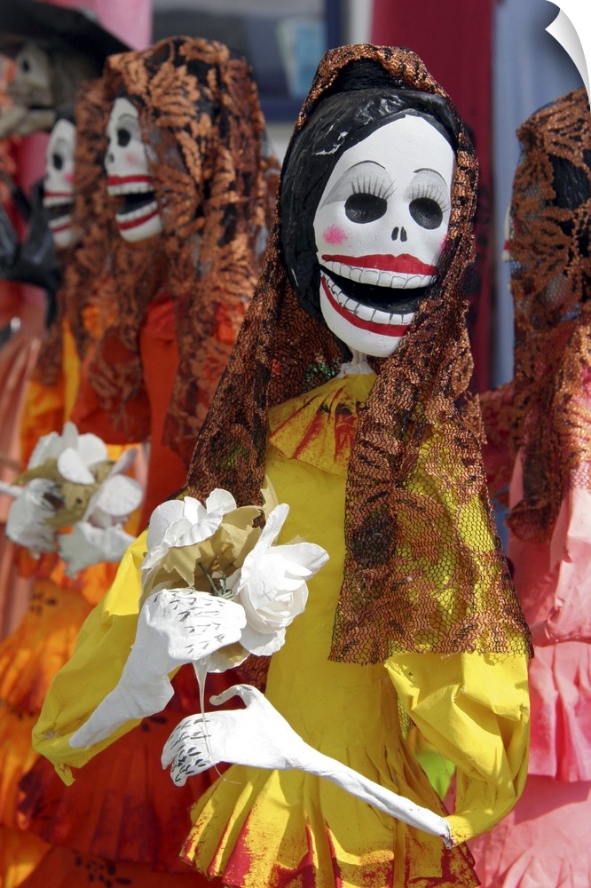 Latin America, Mexico. Skeletal Catrinas, figures celebrating Dia de Los Muertos.