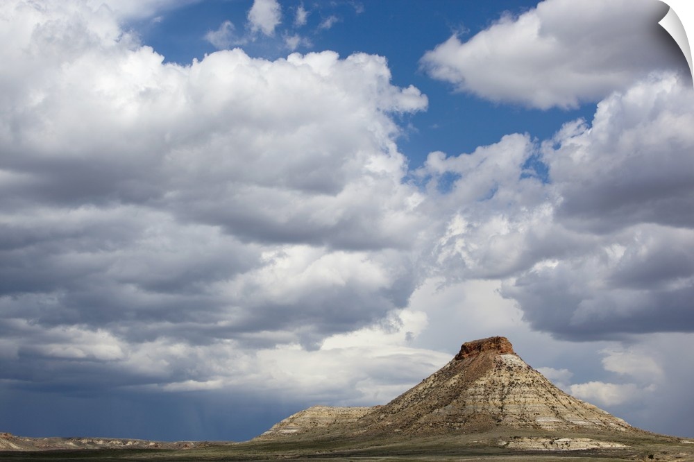 USA, Montana, Terry, Gathering storm clouds over hoodoo in badlands of eastern Montana