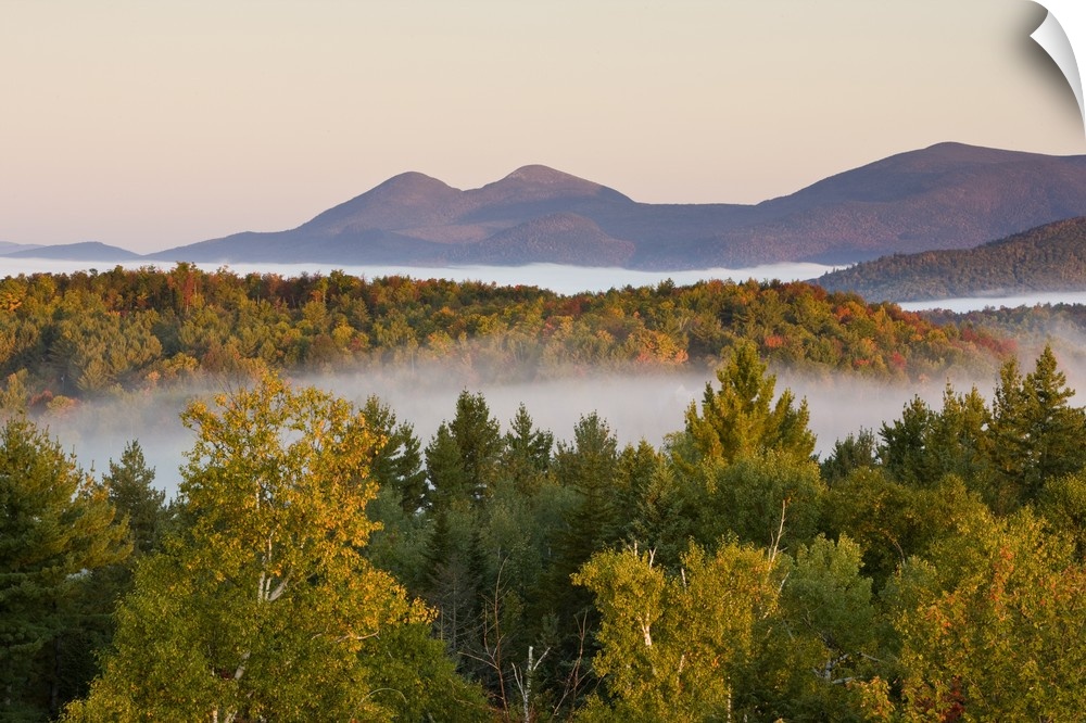 Morning fog and the Percy Peaks as seen from the fire tower at Milan Hill State Park in Milan, New Hampshire.