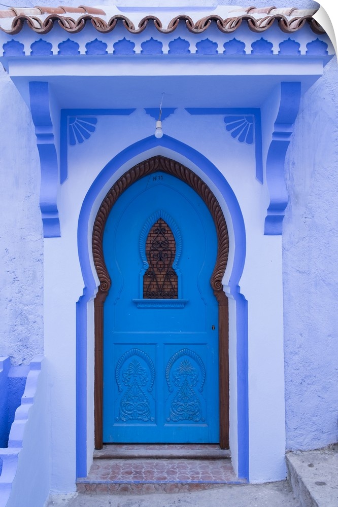 Morocco, Chefchaouen. A traditional door and entrance to a home in the village.