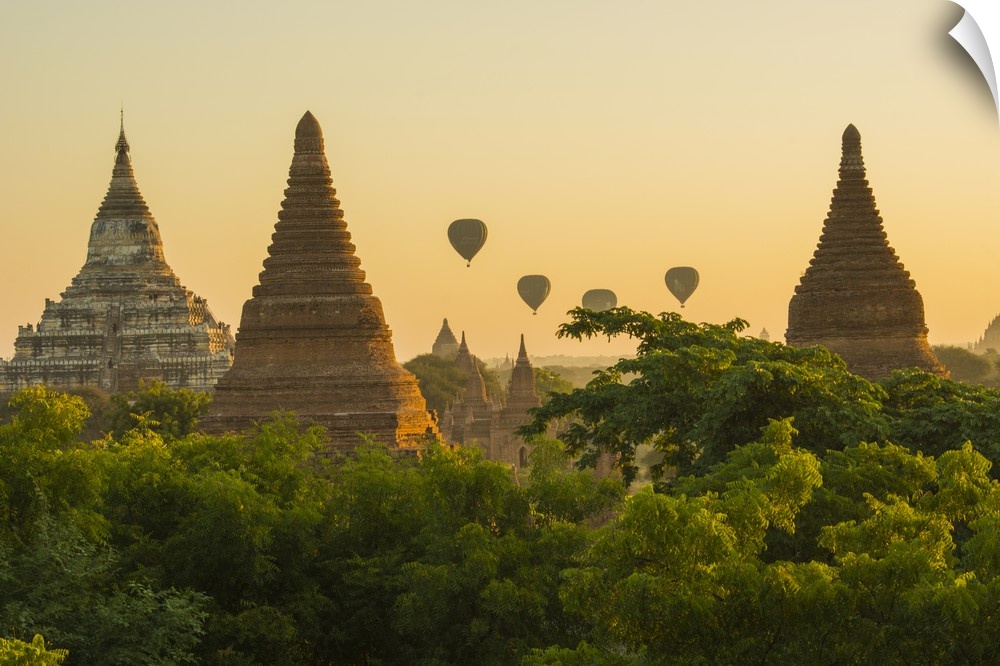 Myanmar. Bagan. Hot air balloons rising over the temples of Bagan.
