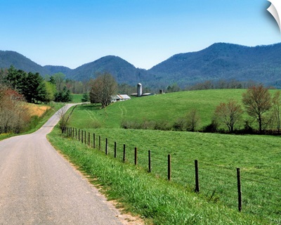 NC, A winding road leads to an isolated farm in the hills near Asheville