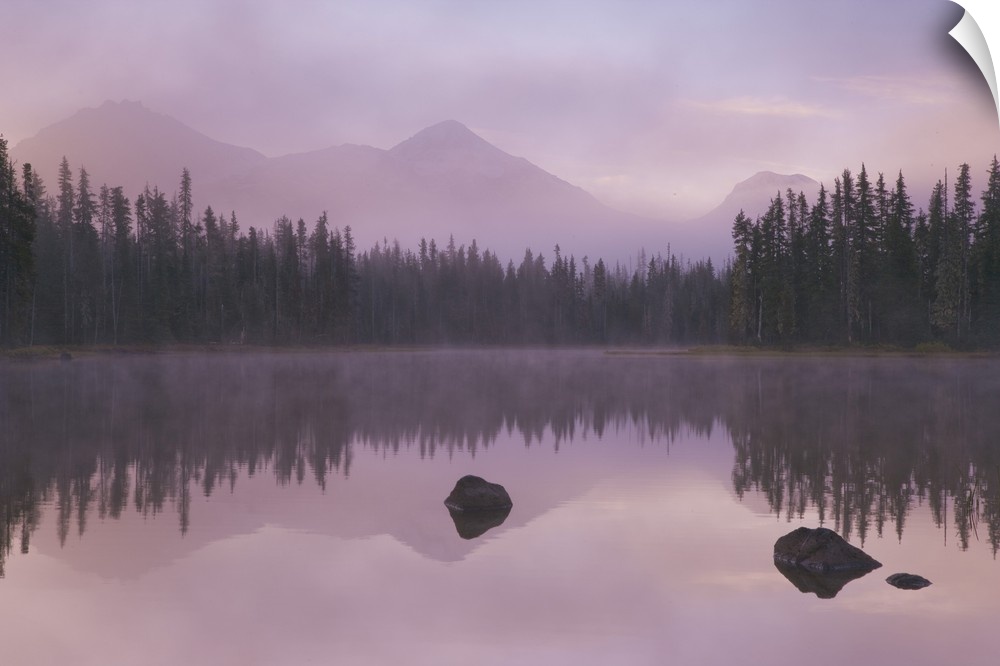 USA, Oregon, Willamette National Forest. Foggy sunrise on Scott Lake and Three Sisters mountains.