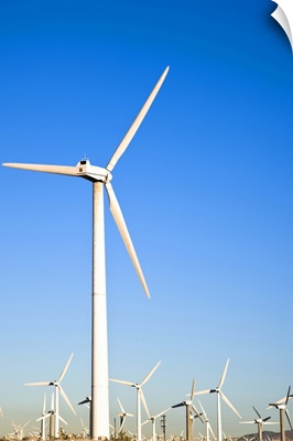 Palm Springs, California, wind turbines in the desert under a clear blue sky