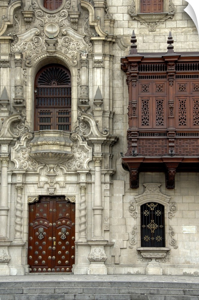 South America, Peru, Lima. Historic Plaza de Armas (aka Plaza Mayor). Moorish style wooden balcony of the Archbishop's Pal...