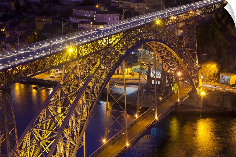 Portugal, Porto. Dom Luis I Bridge lit at night.