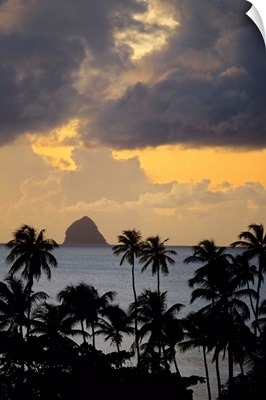 The sun sets behind Diamond Rock, Martinique