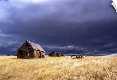 USA, Idaho, Highway 36, Liberty Storm Passing Over Old Wooden Barn