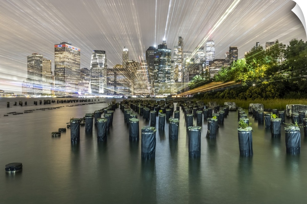 USA, New York. Downtown view from Pier 1, wooden pilings in front of river in Brooklyn Heights. United States, New York.