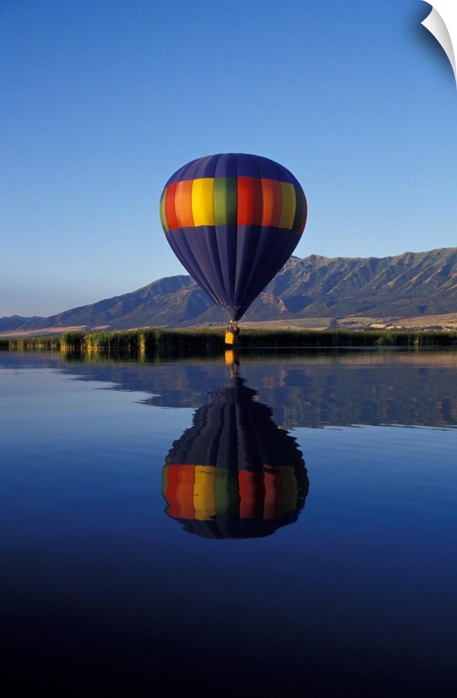 Utah, Cache Valley, Hot air balloon on Logan River Marshes at sunrise.