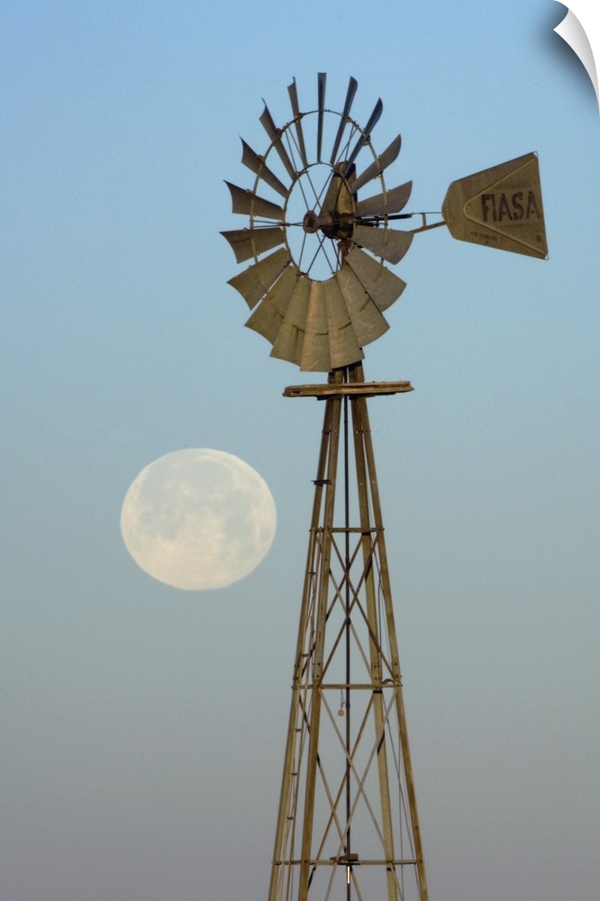 Windmill at sunrise with Full Moon, Canyon, Panhandle, Texas, USA, February 2006