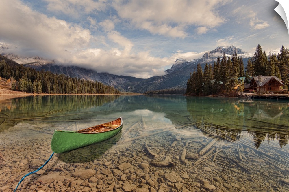 Boat on emerald lake in Yoho national park, British Columbia, Canada. It is the largest of Yoho's 61 lakes and ponds, as w...