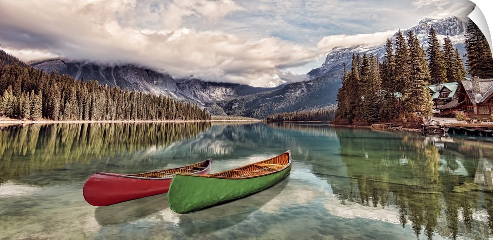 Boats on emerald lake in Yoho national park, British Columbia, Canada. It is the largest of Yoho's 61 lakes and ponds, as ...