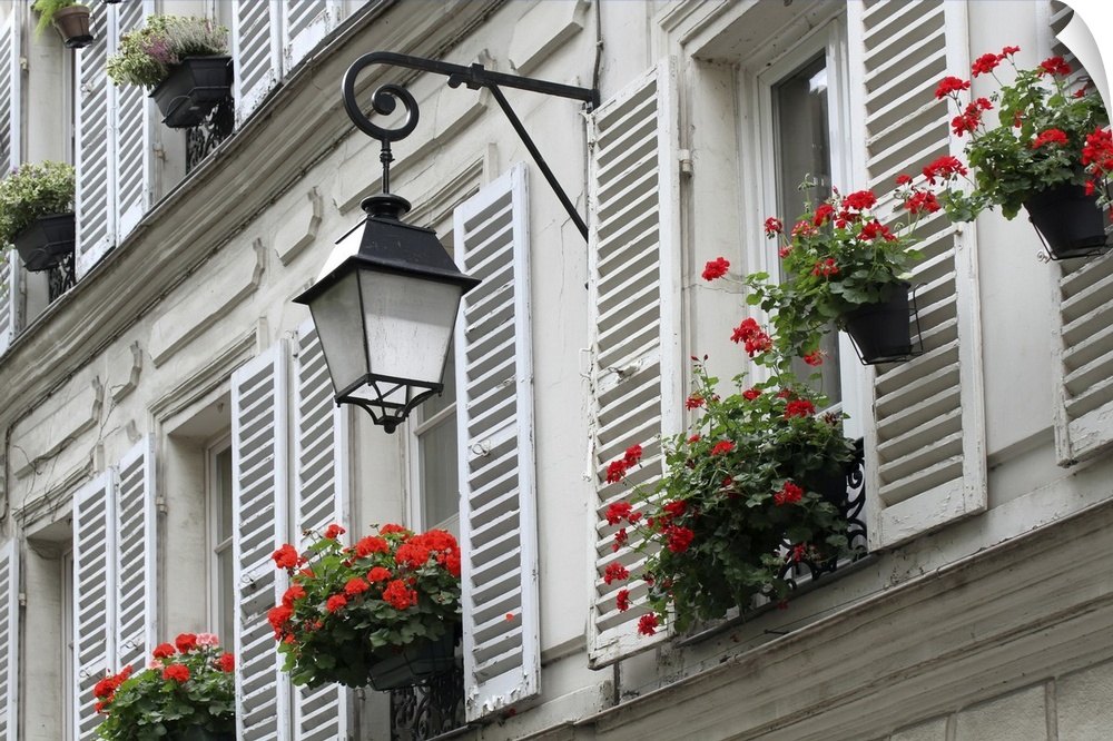 Windows with shutters of old buildings on Montmartre, Paris.