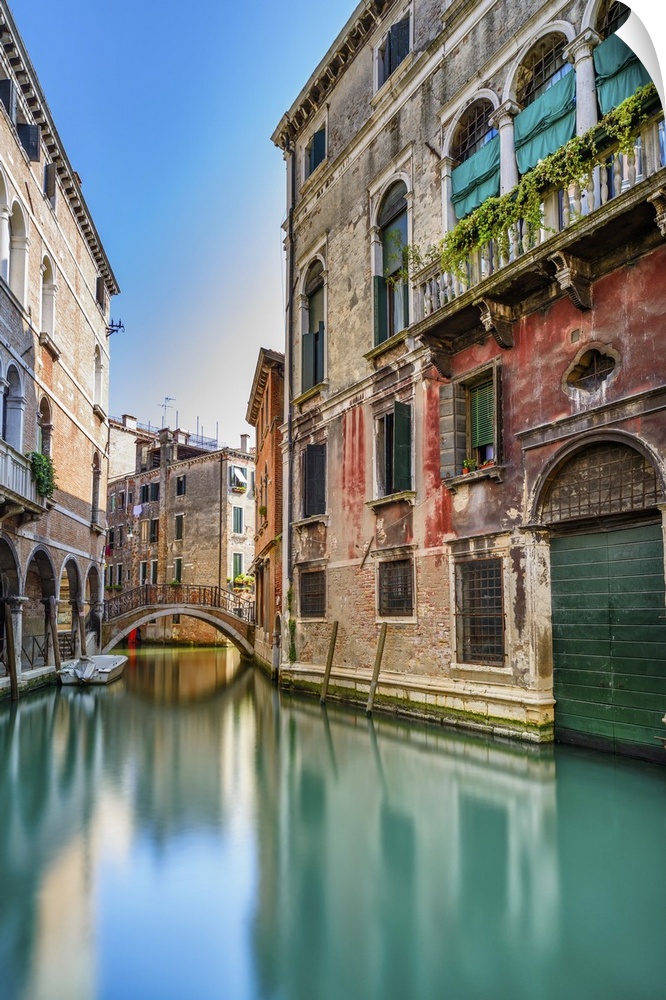 Venice cityscape, narrow water canal, bridge and traditional buildings. Italy, Europe.