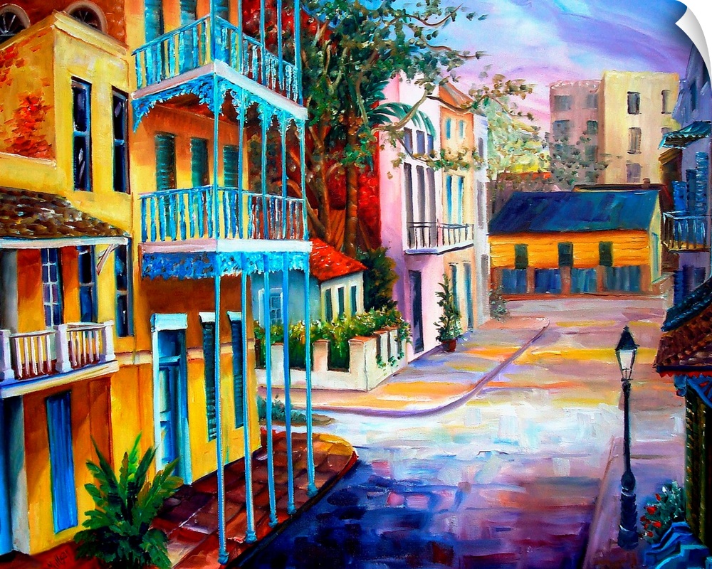 Landscape painting on a large wall hanging of the sun rising over the streets of French Quarter in New Orleans, Louisiana.
