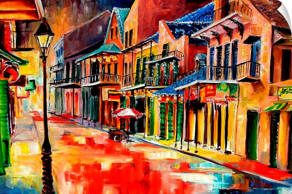 Huge contemporary art shows the vibrantly colored buildings lit up on a quiet street in Louisiana at night.