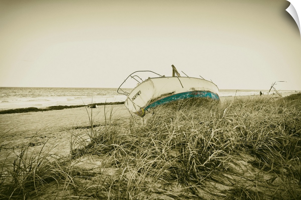 Boat wreck on beach.