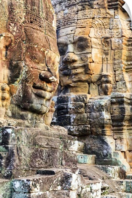 Cambodia, Siemreab, Angkor, Carved Buddha faces in the Bayon Temple
