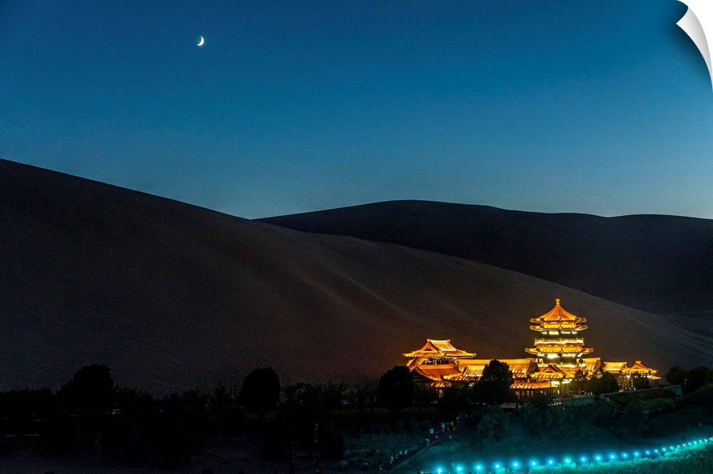 China, Gansu, Dunhuang, Crescent lake and the oasi out of the city of Dunhuang by night.