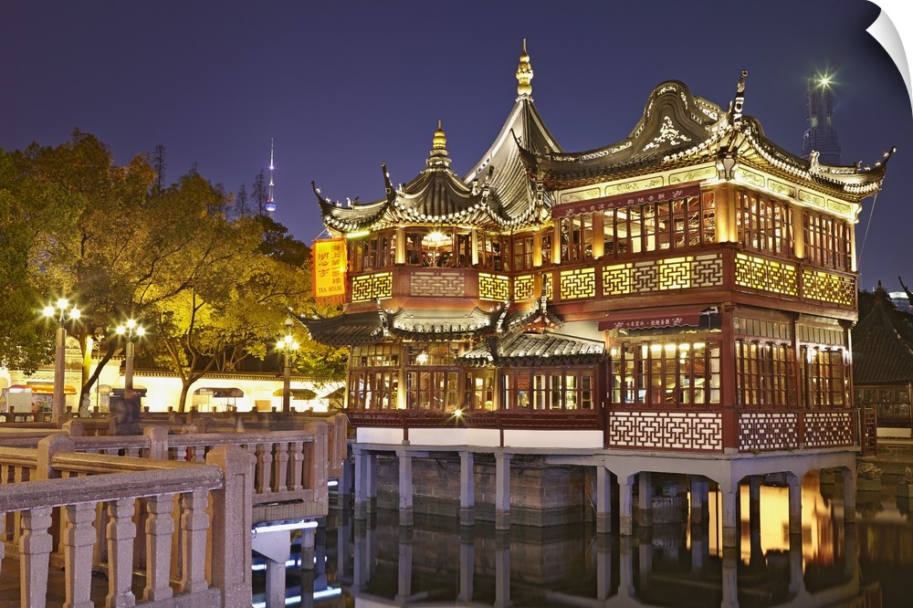 China, Shanghai, Huxinting Teahouse illuminated at night, Yuyuan Gardens.