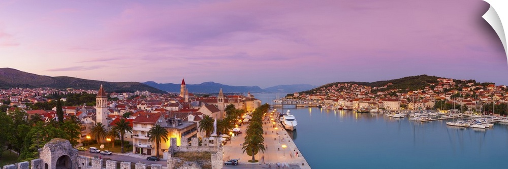 Croatia, Dalmatia, Trogir, Balkans, Adriatic Coast, Stari Grad (old town) illuminated at dusk.